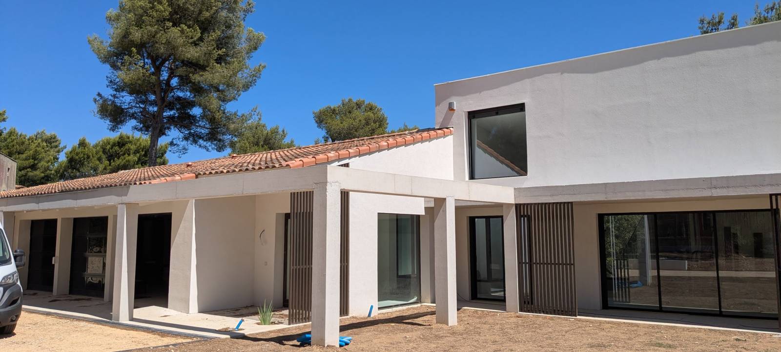 SURÉLÉVATION ET RÉNOVATION D'UNE MAISON À ROQUEFORT LA BÉDOULE