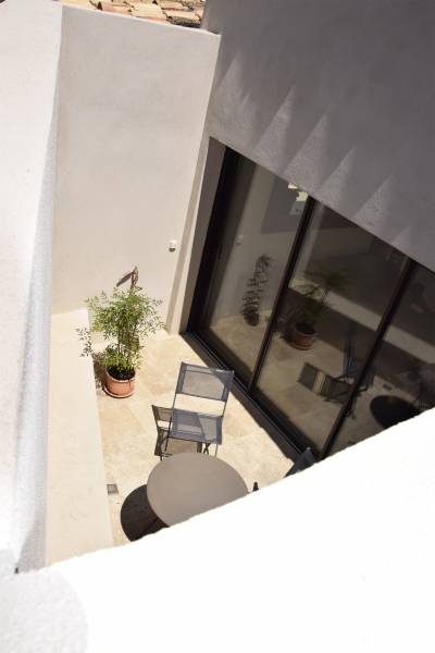 Rénovation d'une maison ancienne avec patio